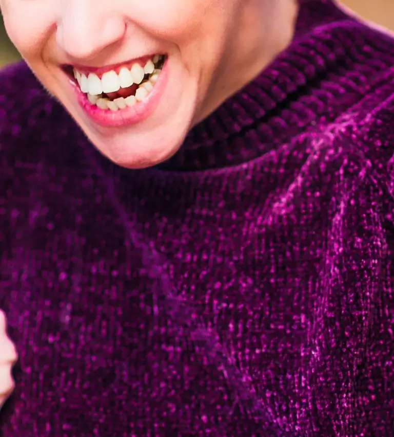 a disabled woman with a smile on her face