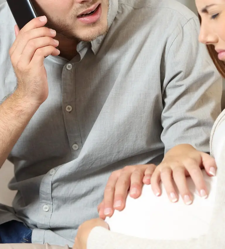 a pregnant woman with a husband 