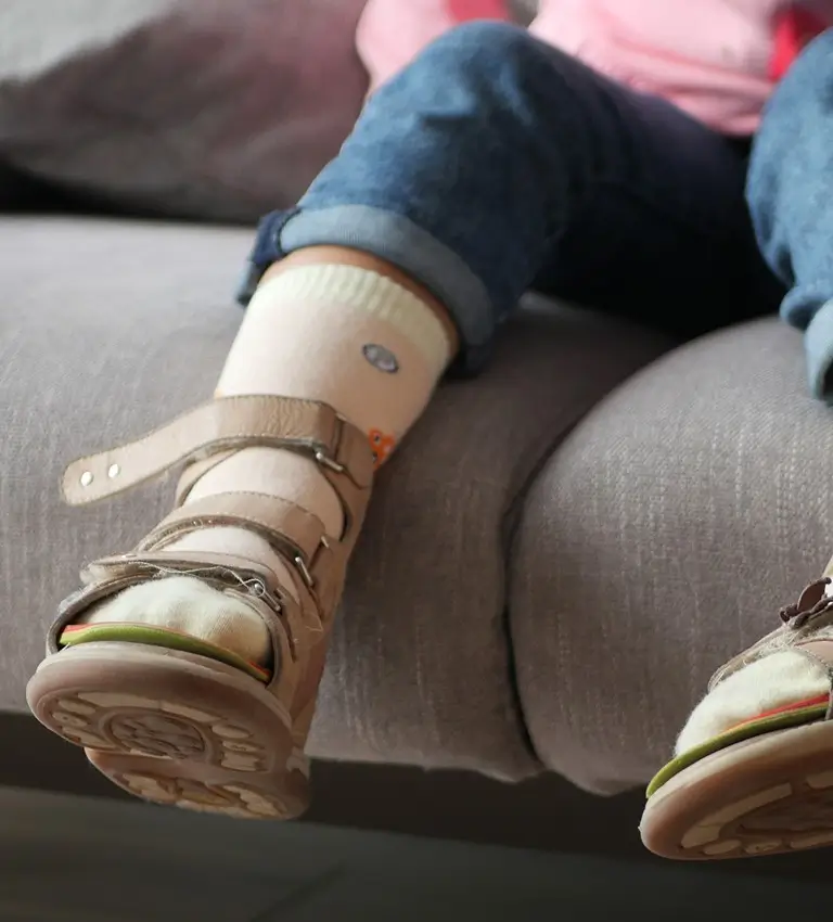 a child sitting on a couch