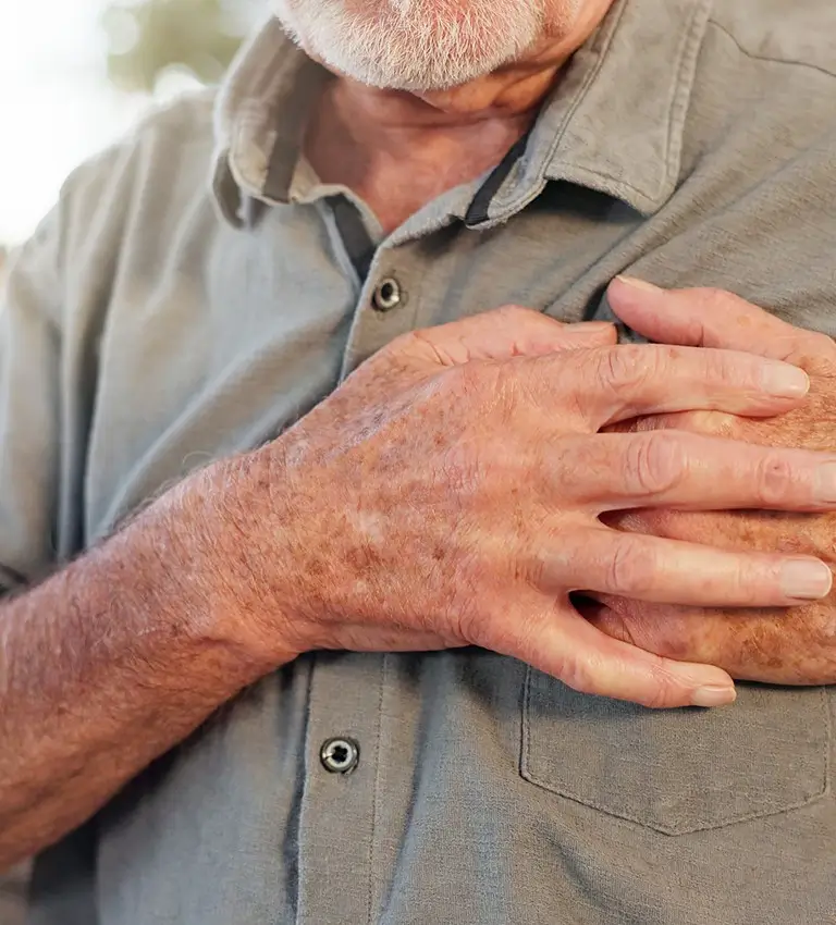 an older man with a chest pain