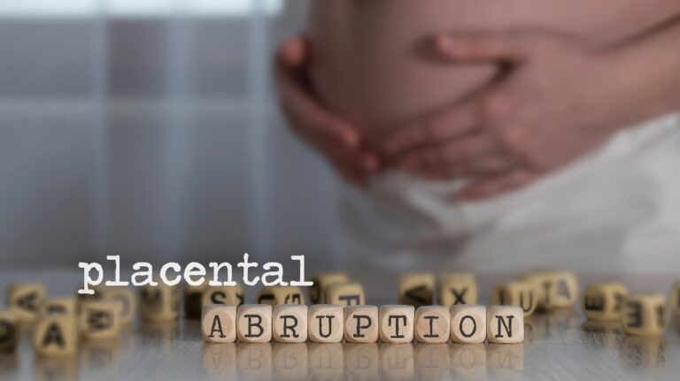 Words PLACENTAL ABRUPTION composed of wooden letters